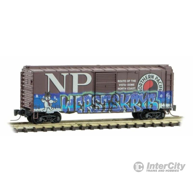 Micro Trains Z 50044870 40' Single-Door Boxcar - Ready to Run -- Northern Pacific (Weathered, Boxcar Red, Christmas Graffiti)
