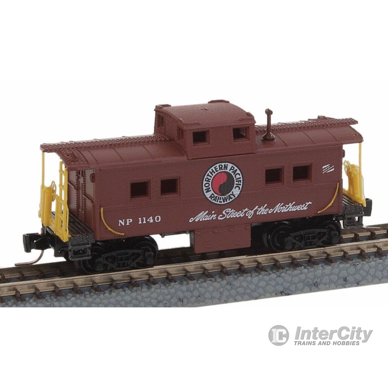Micro Trains Z 53500380 Steel Center-Cupola Caboose - Ready to Run -- Northern Pacific #1140 (Boxcar Red, Main Street Slogan)