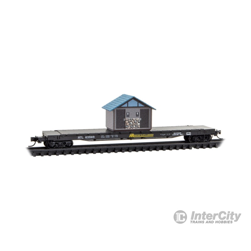 Micro Trains N 6400510 57' 6" Flatcar with Outhouse Load - Medford, Talent, & Lakecreek #63569 (April Fools, black, yellow, white)